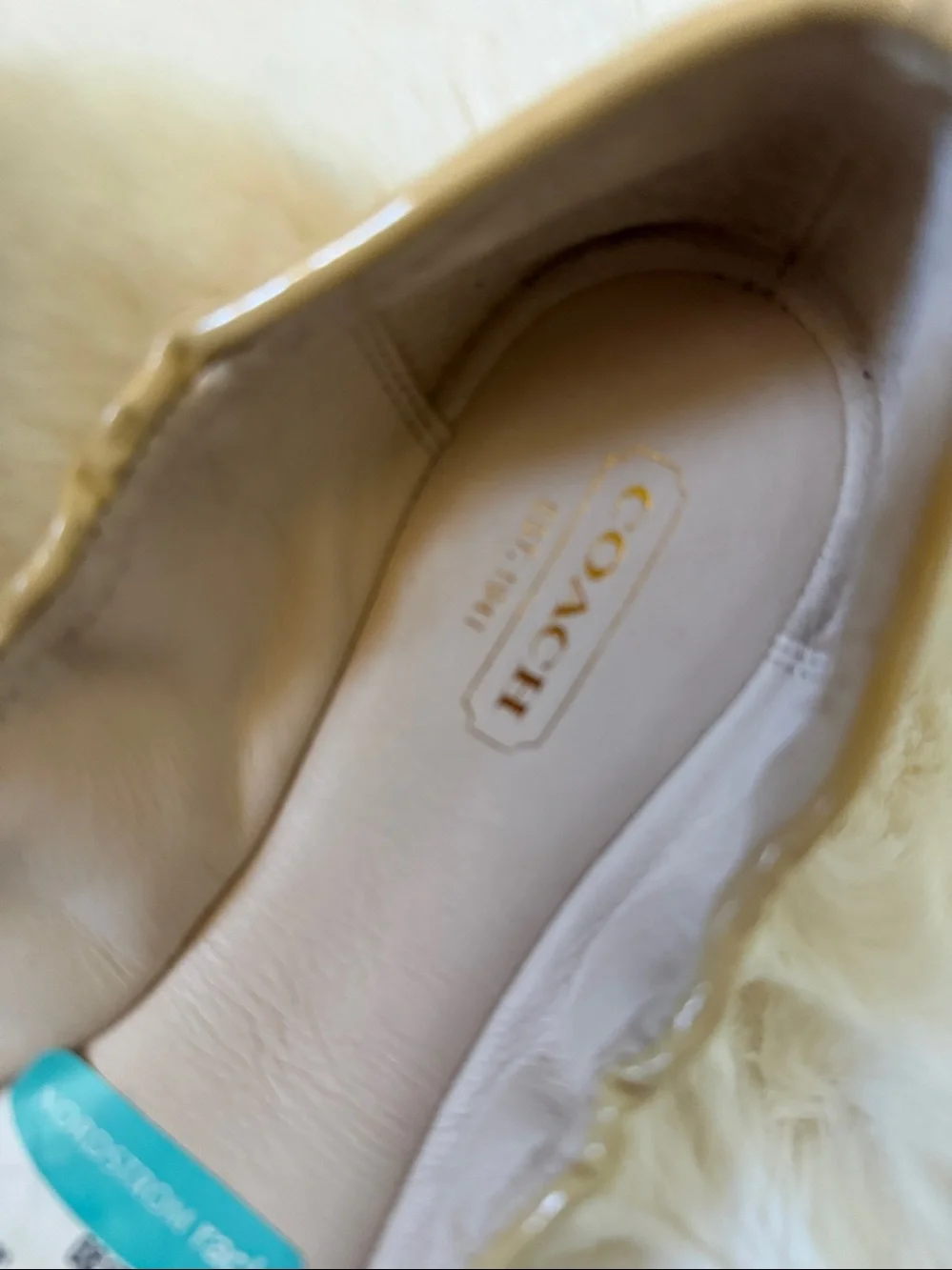 Coach Two-Tone Patent Leather Ballet Flats in Beige and Black with Gold Bow